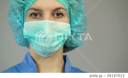 Woman doctor in protective mask blue uniform 39197022