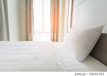 white bedding sheets and white pillow in bedroom white bedding sheets and white pillow in bedroom 39202783