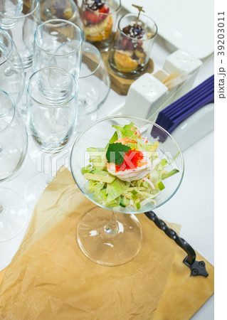 Salad with shrimp, red caviar, vegetables and Salad with shrimp, red caviar, vegetables and 39203011