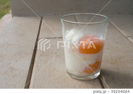 Half cooked or half boiled or poached eggs 39204084