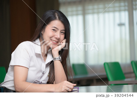 cute young asian student in uniform  39204544