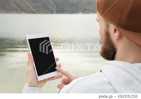 Close-up of a horde in a brown cap in the open air 39205250