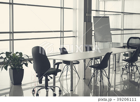 Workplace with furniture in business center 39206111