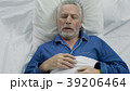 Aged male loudly snoring and puffing in bed Aged male loudly snoring and puffing in bed 39206464