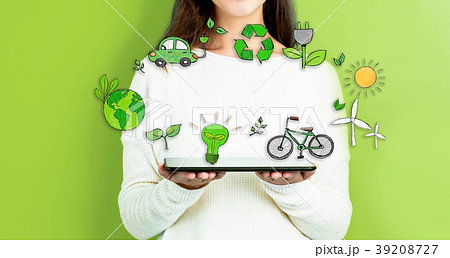 Ecology with woman holding a tablet Ecology with woman holding a tablet 39208727