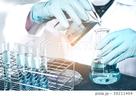 Scientist with equipment holding tools during Scientist with equipment holding tools during 39211404