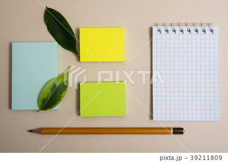 Notepad three different colored sticky papers  39211809