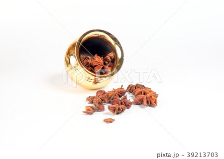 Star anise spice in shiny metal pot Star anise spice in shiny metal pot 39213703