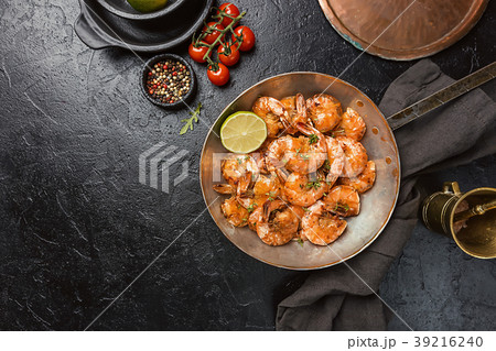 with lemon and thyme in a pan, top 39216240