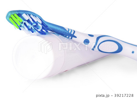 Toothbrush and toothpaste on white background. 39217228