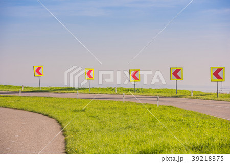 Turn left sign on a country road 39218375