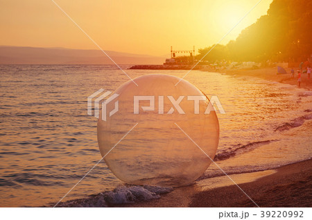 water ball on the sunset beach at summer 39220992
