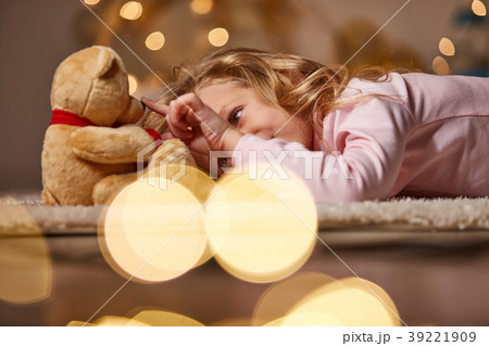 Joyful little child playing with toy Joyful little child playing with toy 39221909
