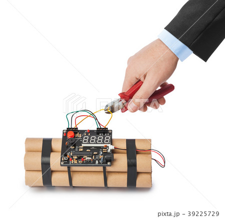 Hand with pliers and dynamite bomb 39225729