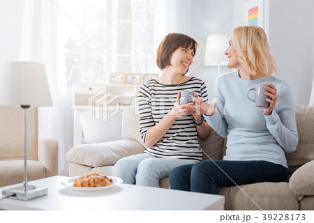 Nice happy women having a conversation 39228173