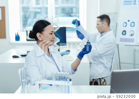 Content scientist making an important experiment 39232030