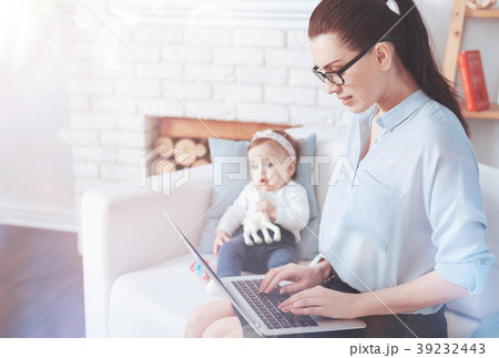 Serious intelligent woman typing 39232443