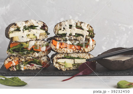Vegan sushi sandwich onigirazu with tofu  39232450