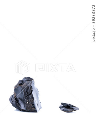 Pieces of black resins isolated on a white Pieces of black resins isolated on a white 39233872