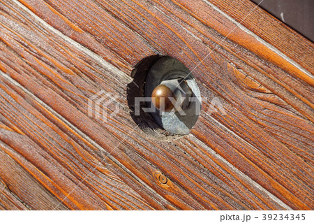close up of old rusty screw head on rustic wooden close up of old rusty screw head on rustic wooden 39234345