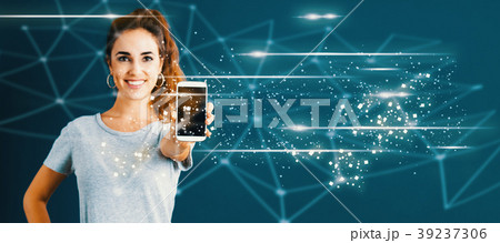 Links with young woman holding out a smartphone  39237306