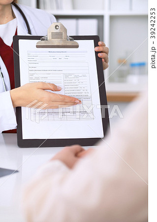 Close up of a female doctor pointing into an 39242253