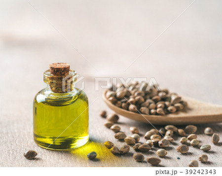 Hemp seeds and hemp oil, copy space Hemp seeds and hemp oil, copy space 39242343