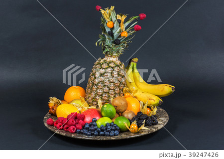 fresh tropical fruits on a plate 39247426