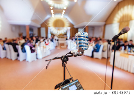 Microphone on blurred of speech in seminar room Microphone on blurred of speech in seminar room 39248975