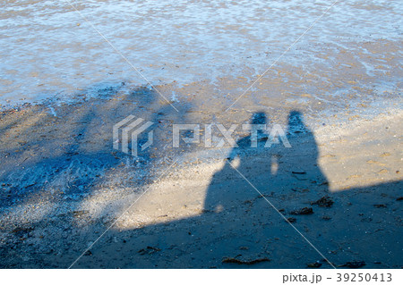 Human shadows on a beach in Australia Human shadows on a beach in Australia 39250413