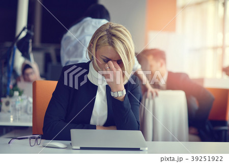 Feeling tired and stressed. Frustrated adult woman Feeling tired and stressed. Frustrated adult woman 39251922