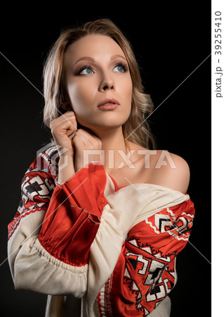 Sexy woman in folk style dress portrait 39255410