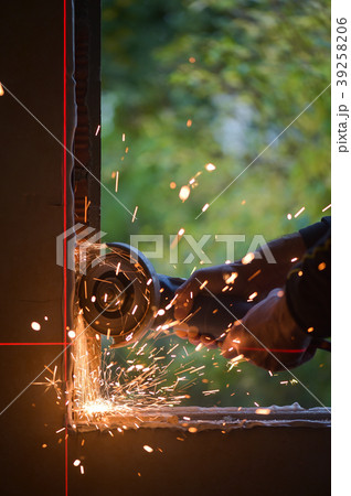 Window renovation-Metal grinding with orange 39258206