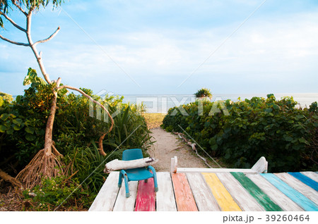 Colourful wooden beach decking at tropical island 39260464