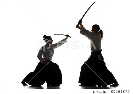 Man and woman fighting and training aikido on 39261379