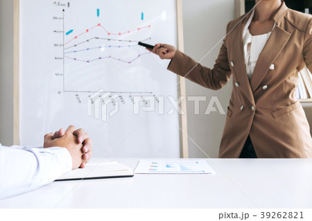 Business woman leader making presentation with her colleagues, p Business woman leader making presentation with her colleagues, p 39262821