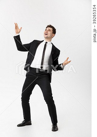 Business Concept - Handsome cheerful businessman 39265354