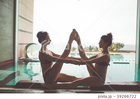 Two pretty young flexible women are relaxing in Two pretty young flexible women are relaxing in 39266722