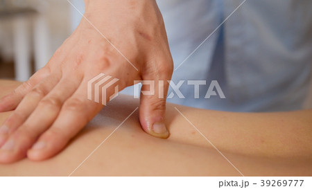 Young model woman model receiving massage at spa - 39269777