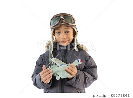 little boy playing with a toy airplane little boy playing with a toy airplane 39275841