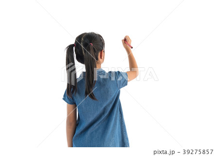 Asian girl writing with a pen. 39275857