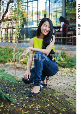 portrait of beautiful asian woman in garden portrait of beautiful asian woman in garden 39276933