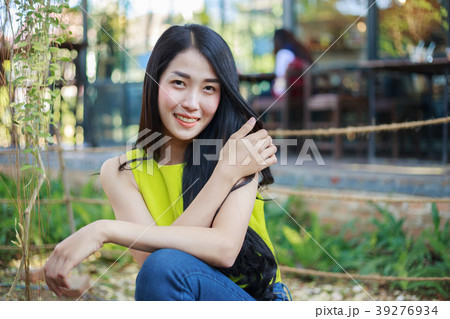 portrait of beautiful asian woman in garden 39276934