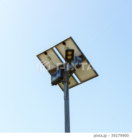 Road lamp with small solar panel on blue sky 39279900