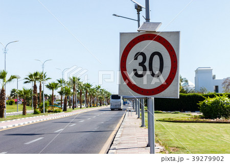 Speed limit sign with solar panel in the road 39279902