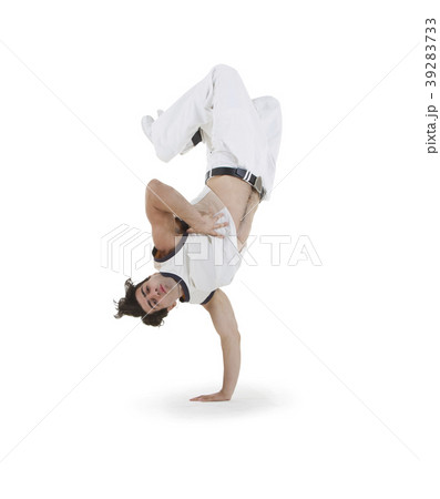 Teenager dancing breakdance in action Teenager dancing breakdance in action 39283733