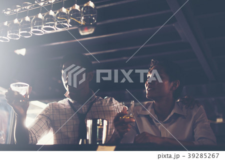 bartender in counter at nightclub bartender in counter at nightclub 39285267