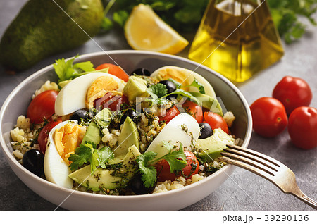 Bulgur salad with eggs, avocado, tomatoes . 39290136