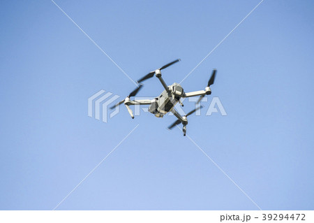 drone flying during the day on a blue sky drone flying during the day on a blue sky 39294472