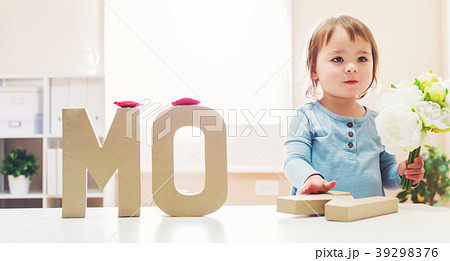 Toddler girl celebrating Mothers Day Toddler girl celebrating Mothers Day 39298376